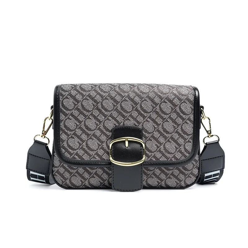 Letter Clasp Crossbody — The Signature Detail