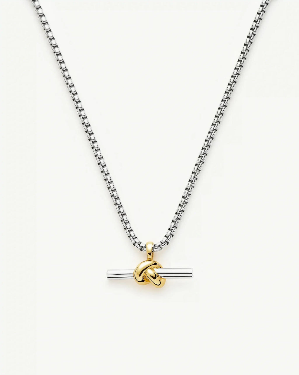Chunky knot T-bar necklace in gold and silver tones, front product view