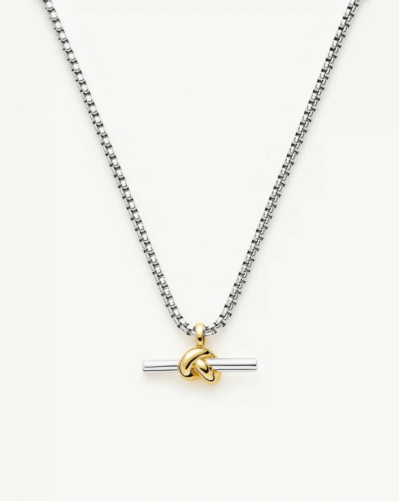 Chunky knot T-bar necklace in gold and silver tones, front product view